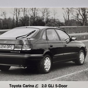 Foto Toyota Carina E (autopers foto foto autobedrijf luxe dealer dealer verkoop print japans 2.0 GLi 5-Deurs)