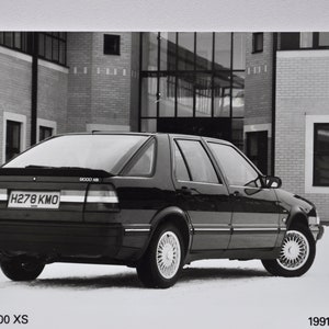 Foto 1991 Saab 9000XS (autopers foto foto autobedrijf luxe dealer dealer brochure verkoop print zweedse sedan auto 9000 XS)