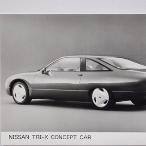 Foto 1992 Nissan TRI-X Concept Car (autopers foto foto motor dealer dealer verkoop brochure print poster oud Japans prototype)