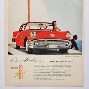 Grote auto-advertentie 1957 Oldsmobile Golden Rocket 88 Holiday Coupe Eighty-Eight (GM General Motors Company klassieke oude fotoadvertentieafdruk)