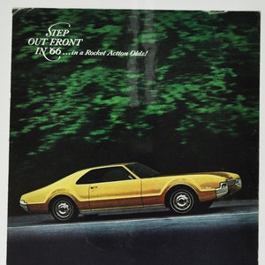 Auto-Werbung 1966 Oldsmobile Toronado (laden gm usa us) 1966 Oldsmobile Toronado mit klassischem Foto-Werbung