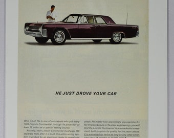 May include: A vintage advertisement for the 1962 Lincoln Continental. The ad features a burgundy car with a man standing next to it. The text reads "He just drove your car." and "Lincoln Continental."