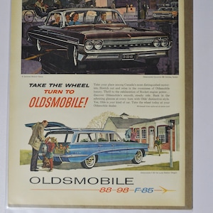 Grote autoadvertentie 1961 Oldsmobile Dynamic 88 Holiday Sedan en F-85 Deluxe Station Wagon (fotoadvertentie GM General Motors-bedrijf olds 98)