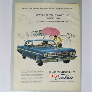 Grote autoadvertentie 1963 Oldsmobile F-85 Cutlass (GM General Motors klassieke oude fotoadvertentie onderdelen brochure afdrukken olds auto raketactie)