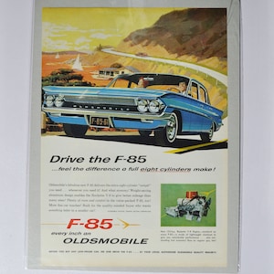 Grote autoadvertentie 1961 Oldsmobile F-85 (GM General Motors Company klassieke oude fotoadvertentie onderdelen brochure gedrukt dealer olds auto machete)