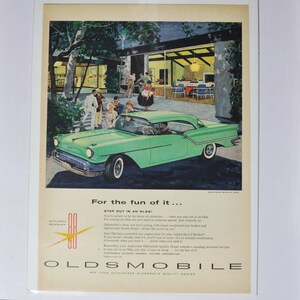 Grote autoadvertentie 1957 Oldsmobile Golden Rocket 88 Holiday Coupe (GM-bedrijf klassieke oude fotoadvertentie gedrukte brochure olds Eighty-Eight)