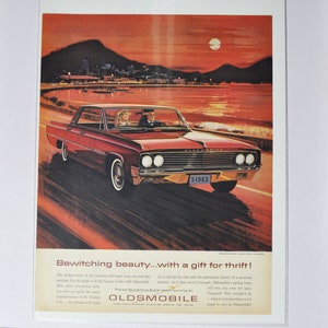 Pubblicità di un'auto di grandi dimensioni, Oldsmobile del 1963 (GM General Motors, pubblicità fotografica classica di vecchia data, brochure stampata di ricambi, concessionario Olds Auto Rocket Action V-8, USA)