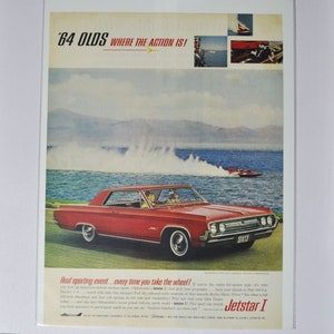 Grote autoadvertentie 1964 Oldsmobile Jetstar 1 (GM General Motors klassieke oude fotoadvertentie onderdelen brochure gedrukt olds auto raketactie VS)