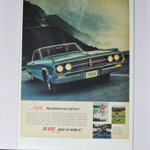 Grote autoadvertentie 1964 Oldsmobile Jetstar (GM General Motors klassieke oude fotoadvertentie onderdelen gedrukte brochure olds auto raketactie VS 1)