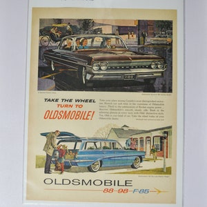 Grote autoadvertentie 1961 Oldsmobile Dynamic 88 Holiday Sedan en F-85 Deluxe Station Wagon (fotoadvertentie GM General Motors-bedrijf olds 98)