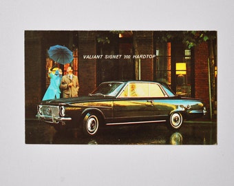 Postcard - Plymouth Valiant Signet 200 Hardtop (car dealer automobile dealership post card ad old classic retro american detroit dealership)
