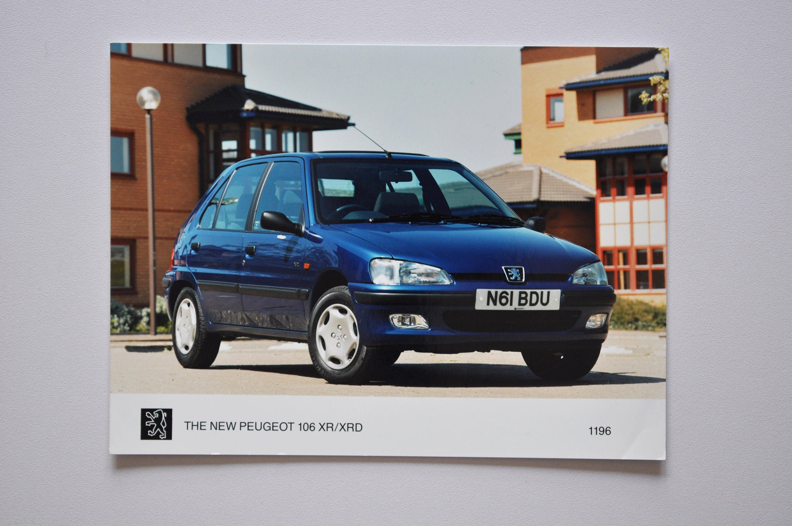 Custom blue peugeot 106 car on Craiyon