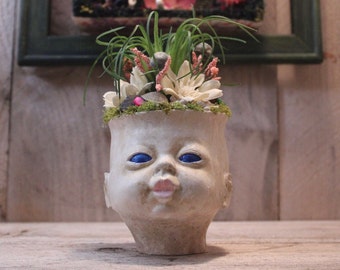 EDEN -  HandCrafted Baby Doll Head Planter Faux Floral Art Piece Arrangement