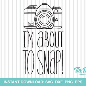May include: Black and white line art illustration of a vintage camera with the text "I'm about to snap!"  The text is in a handwritten style font.