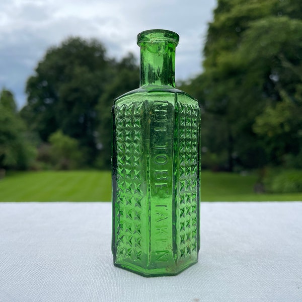 Vintage victorian 2oz hobnail coffin-shaped poison bottle in emerald green