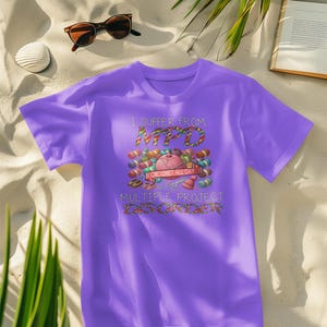 May include: Purple t-shirt with a colorful graphic that says "I suffer from MPD Crochet all day Multiple Project Disorder".