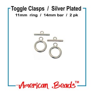 May include: Silver-plated toggle clasps with an 11mm ring and a 14mm bar. The image shows two clasps, perfect for jewelry making. The text on the image reads "Toggle Clasps / Silver Plated" and "American Beads".