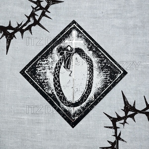 May include: Black and white graphic design featuring an ouroboros snake within a diamond shape, with a cross and text. The design is set against a gray, textured background, with thorny branches in the corners.