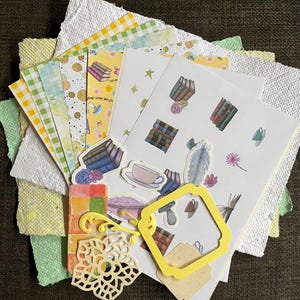 Standard journal packs - 5 A6 sheets of printed paper, 2 sticker sheets, 5 extra stickers, 3 sheets of hand made A5 paper, 5 embellishments