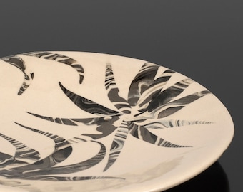 Decorative ceramic plate, black and white clay