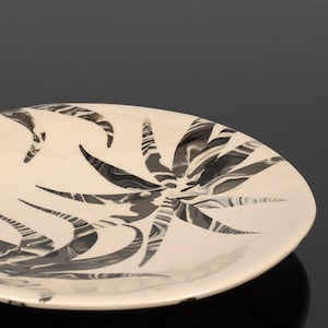 Decorative ceramic plate, black and white clay