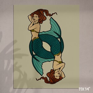 May include: An 11x14 inch print featuring two mermaids in a mirrored design. The mermaids have red hair, teal fishtails, and are wearing gold-colored tops. The artwork has a vintage aesthetic with a neutral background.