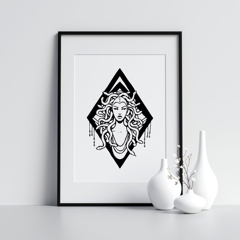 May include: Black and white illustration of Medusa, the Greek mythological figure with snakes for hair, inside a diamond shape.