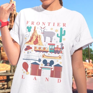 Camiseta con iconos de Frontierland