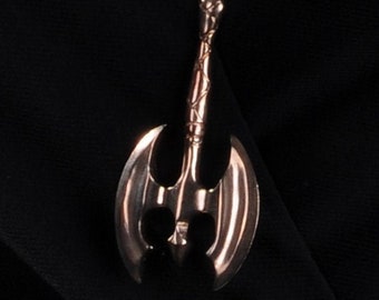 May include: A silver chain necklace with two pendants. One pendant is a geometric shape and the other is a silver axe.