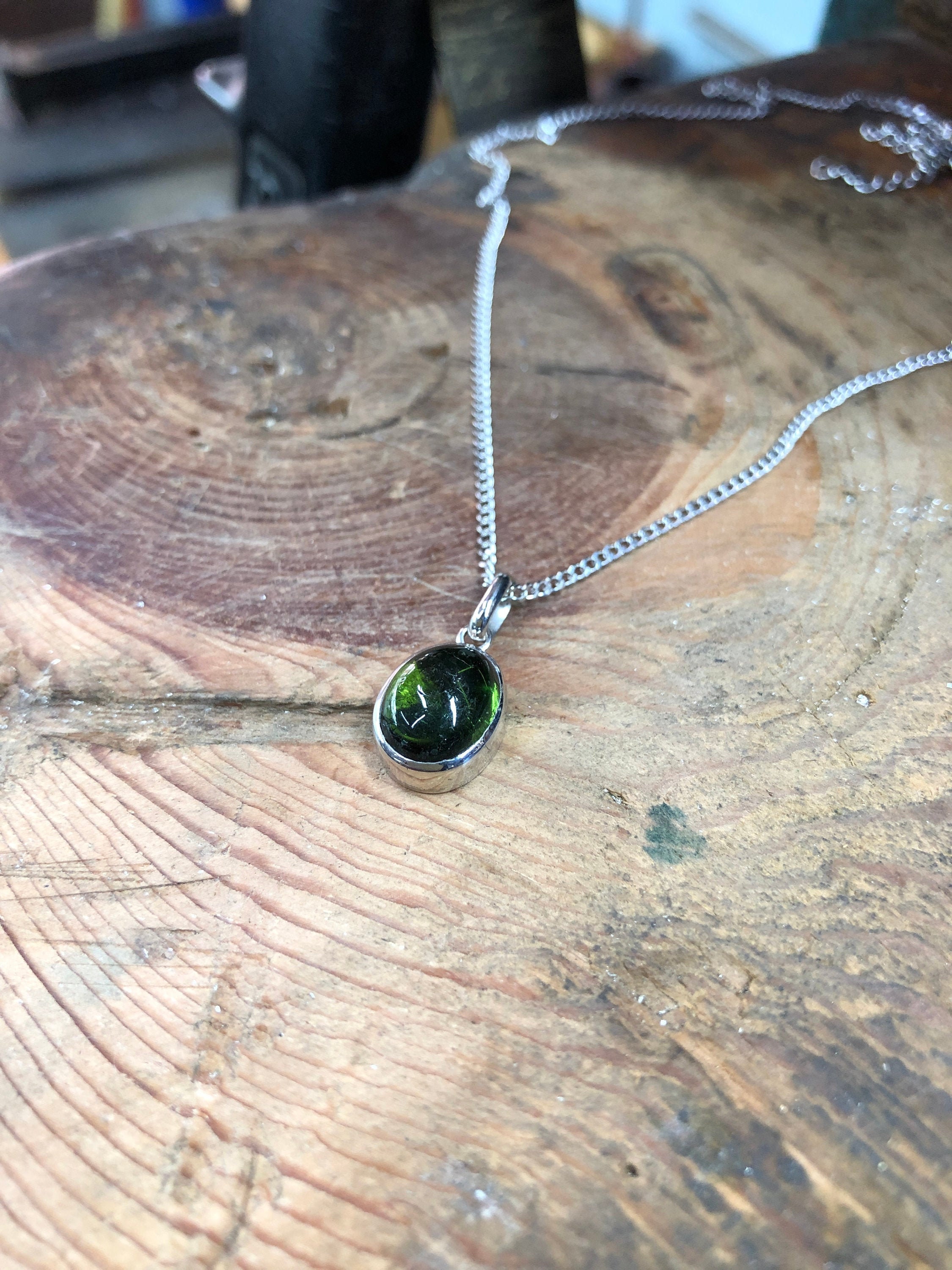 Gold Starburst Necklace with Green Stone – The Consortium Winchester and  Romsey Hampshire