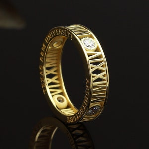 14k gold roman numeral graduation ring with sparkling gemstones