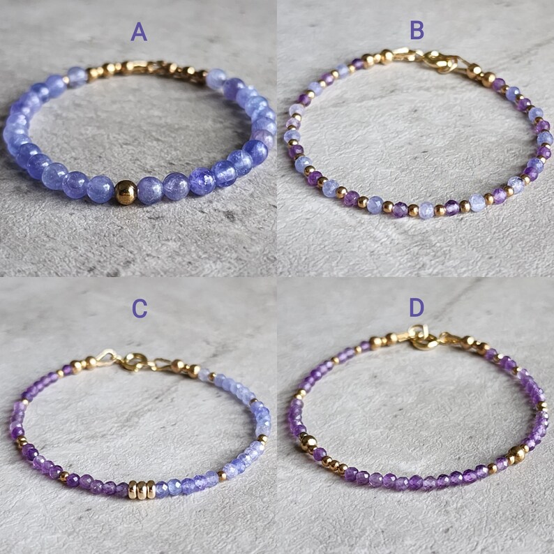 May include: Four bracelets with gold clasps and purple and blue gemstone beads. The bracelets are labeled A, B, C, and D.