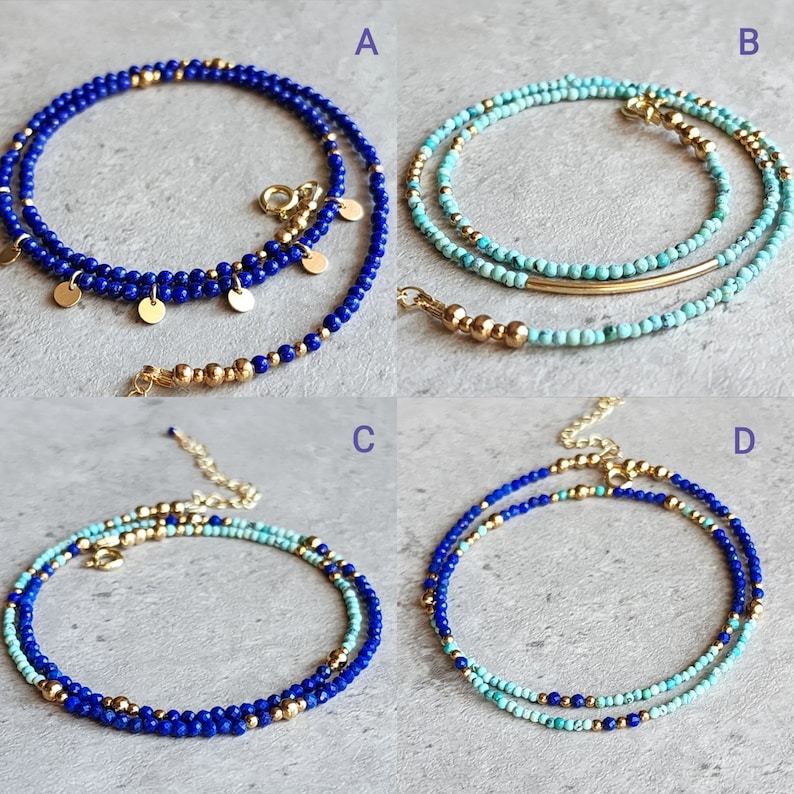 May include: Four different styles of layered beaded necklaces with gold accents. The necklaces are made with blue and turquoise beads.