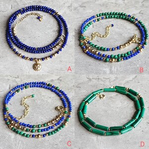 May include: Four different styles of layered necklaces with gold beads and gemstone beads. The necklaces are made with lapis lazuli, malachite, and gold beads.
