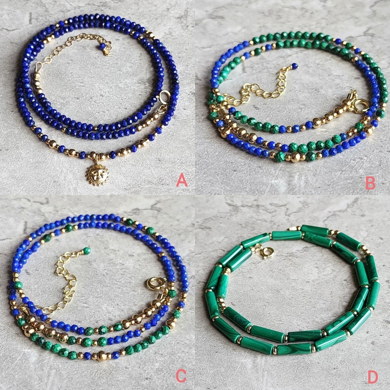 May include: Four different styles of layered necklaces with gold beads and gemstone beads. The necklaces are made with lapis lazuli, malachite, and gold beads.