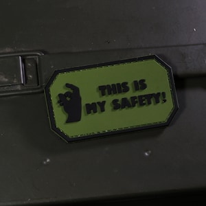 May include: Green and black patch with a hand making the "okay" sign and the text "This is my safety!"