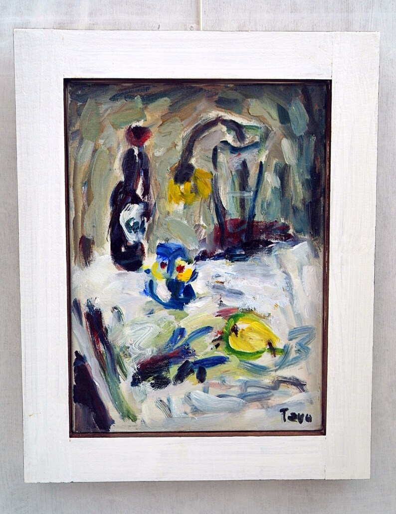 May include: A still life painting featuring a bottle, a glass, and fruit. The painting is done in a loose, expressive style with bold brushstrokes and vibrant colors. The artist's signature, "Taya", is visible in the lower right corner.