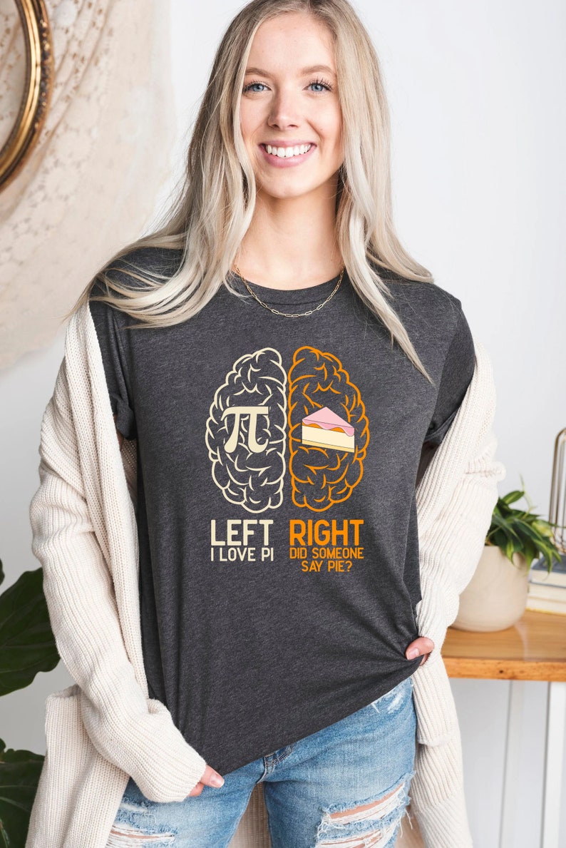 May include: A dark gray t-shirt with a graphic of a brain divided into two halves. The left side says "Left I Love Pi" and the right side says "Right Did Someone Say Pie?"