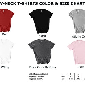 May include: V-neck t-shirt size chart featuring six colour options: red, black, athletic grey, white, dark grey heather, and pink. The chart displays measurements in inches for sizes S, M, L, XL, and 2XL.