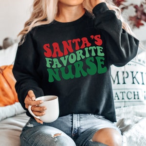 Santa Favorite Nurse, Christmas nurse tee, holiday nurse shirt, Nurse Shirt, Nurse Holiday Gift, Cute Santa Shirt, Retro Santa Shirt image 2