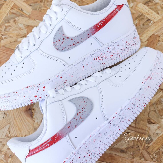 Nike rouge et grise 2025
