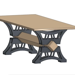 May include: A wooden table with a black metal base. The base has a unique design with multiple arches and supports. The table top is light brown and rectangular.
