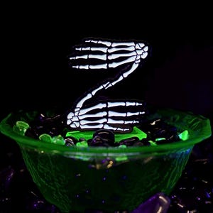 ZEDS DEAD FAMILY merch skeleton hands glow in the dark hat pin dubstep merch, edc, edm, lost lands, electric forest merch, rave merch