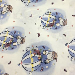 Tissu en flanelle éléphant dans la cour Matériau de pyjama pour bébés Tissu en flanelle doux 100 % coton 94 po. de large Tissu pour montgolfières et bébés animaux