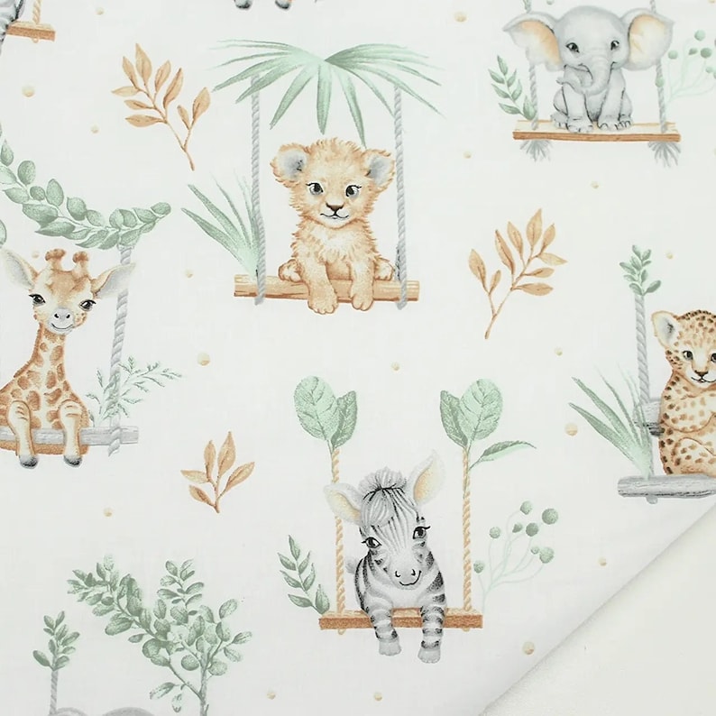 May include: A white fabric with a repeating pattern of jungle animals on swings. The animals include a giraffe, a lion, a zebra, an elephant, and a leopard. The background is white with small brown dots.