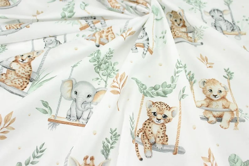 May include: White fabric with a repeating pattern of jungle animals on swings. The animals include a lion, a leopard, an elephant, and a zebra. The animals are drawn in a watercolor style with muted colors.