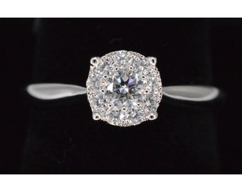 White gold ring with 0.50 carat diamond.