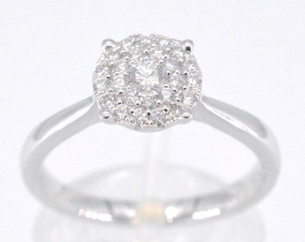 White gold ring with 0.50 carat diamond.