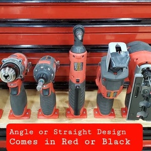 May include: A set of six power tools mounted on a wooden shelf. The tools include a drill, a jigsaw, and four different types of screwdrivers. The shelf is labeled "Angle or Straight Design Comes in Red or Black".