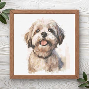 May include: A framed watercolor painting of a small, light-colored dog with a brown collar and tag. The dog has a happy expression with its tongue out. The frame is made of wood.